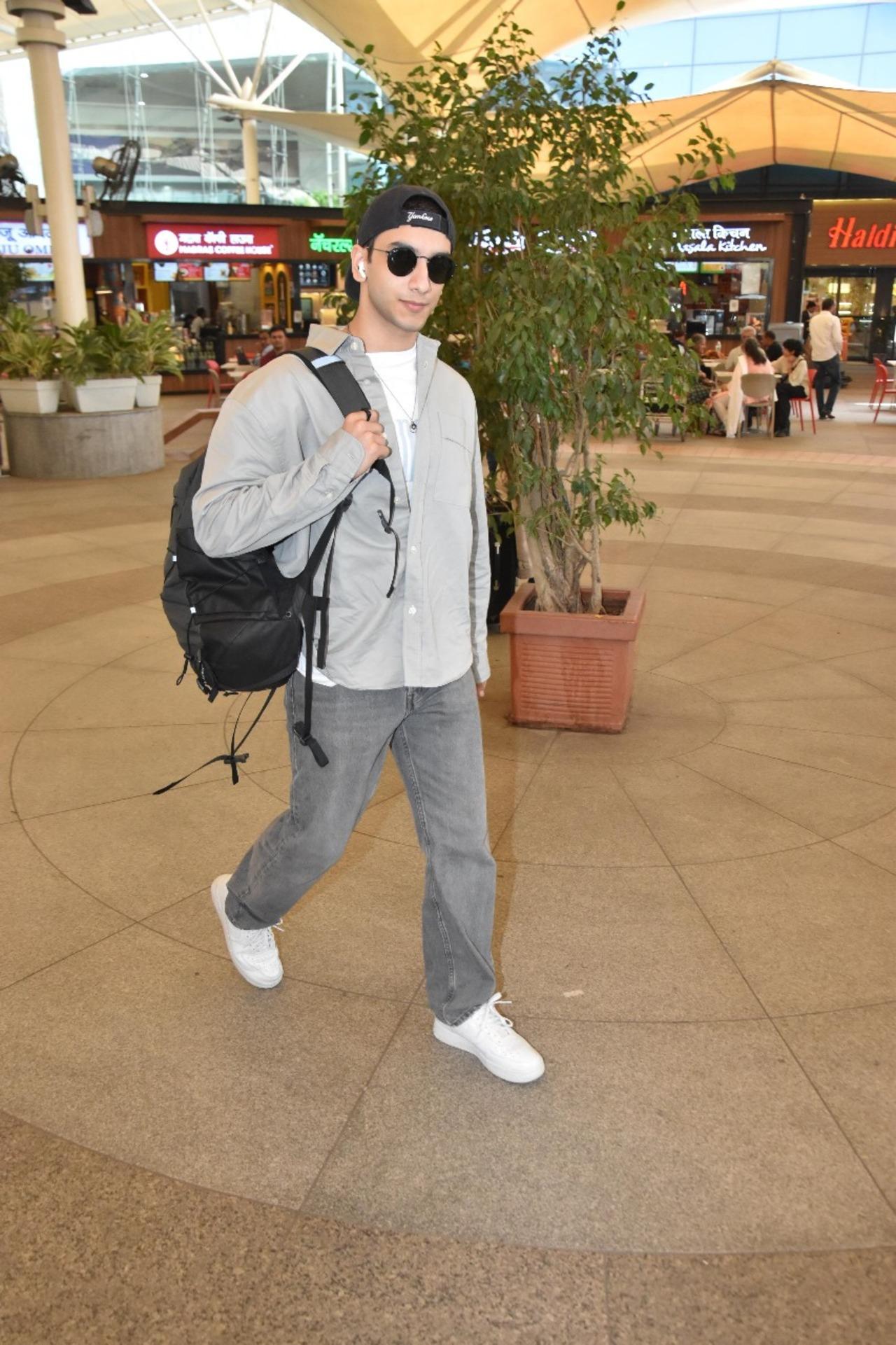 Actor Vedang Raina of 'The Archies,' showcased his sense of style as he was seen leaving the airport. He wore grey jeans and oversized shirt worn over a white t-shirt. He opted to accessorize the look with heavy black sunglasses and a cap